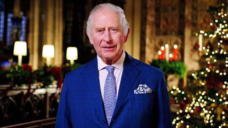 King Charles III is seen during the recording of his first Christmas broadcast in the Quire of St George's Chapel at Windsor Castle