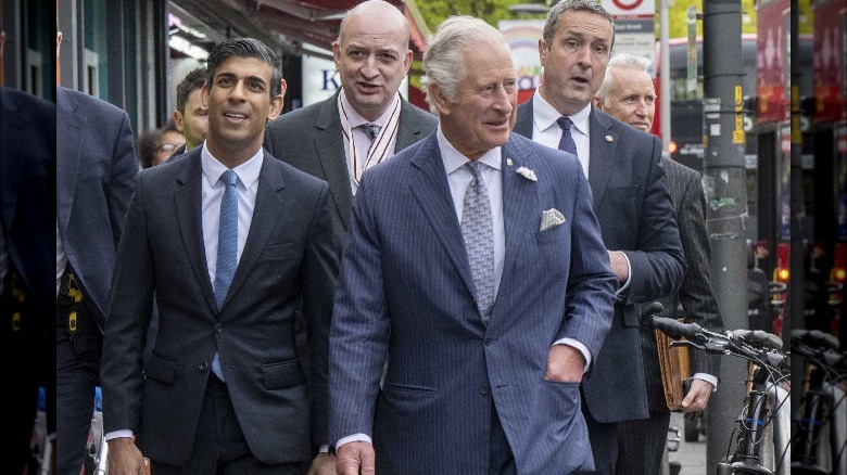 King Charles walks with Rishi Sunak during a previous meeting