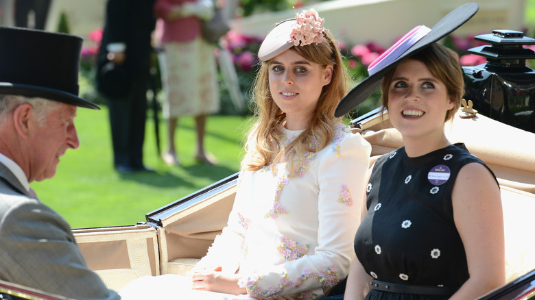 Charles with Eugenie and Beatrice in carriage