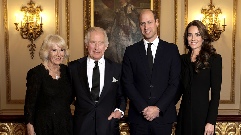 King Charles, Camilla, William, and Catherine posing