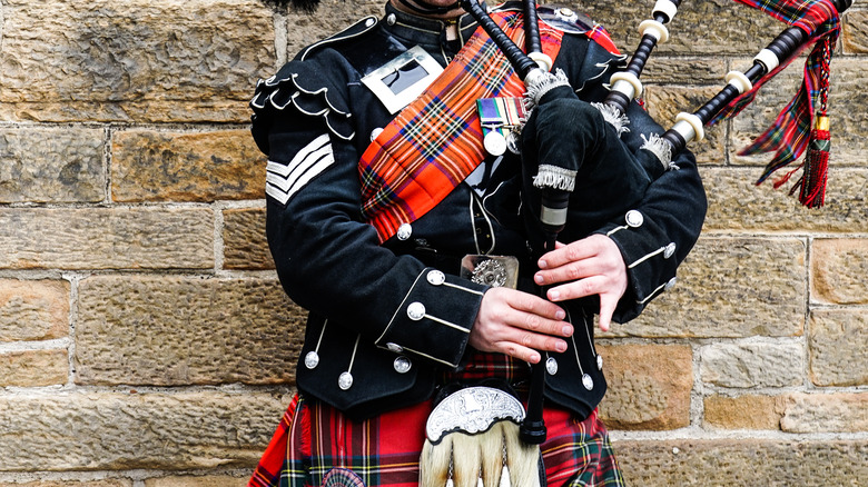 Person playing bagpipes