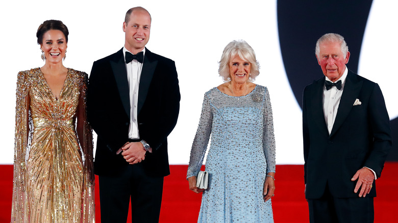 Princess Catherine, Prince William, Queen Camilla, and King Charles III smiling