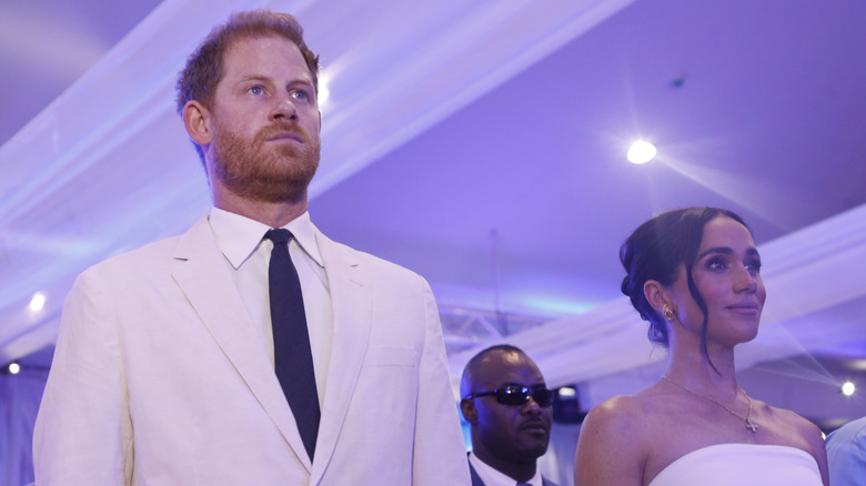 Meghan Markle and Prince Harry standing together