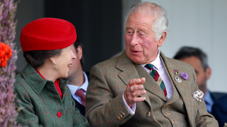 King Charles and Princess Anne laughing