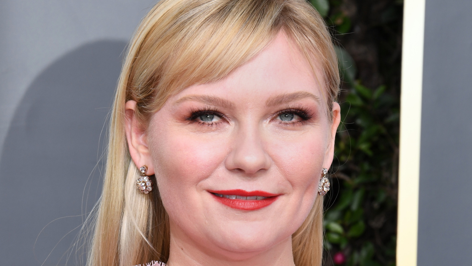 Kirsten Dunst piercing fossette