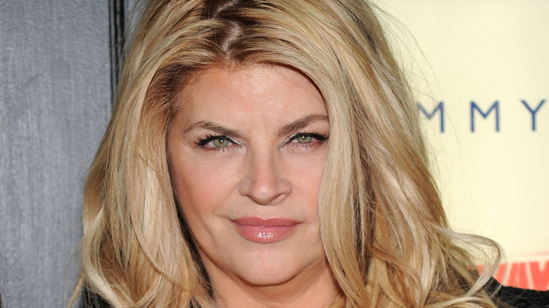 Kirstie Alley poses on the red carpet