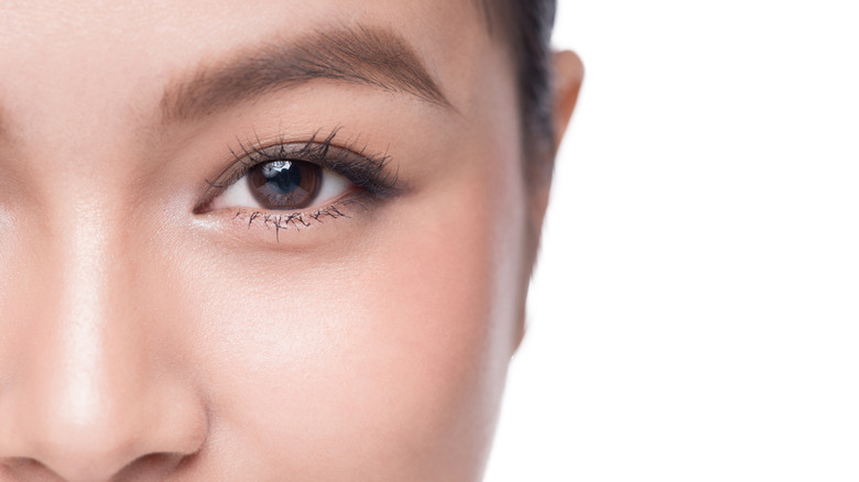 A woman wearing kitten liner