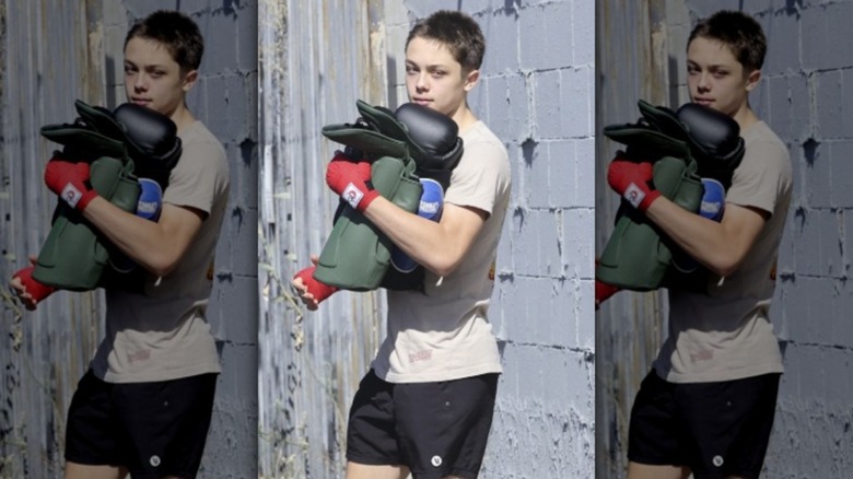 Knox Jolie-Pitt holding his boxing gear on his way out of an L.A. gym, August 2024