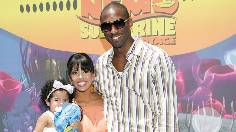 Vanessa Bryant holding Gianna with Kobe