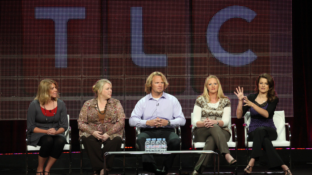 Kody Brown and wives on stage at TLC event