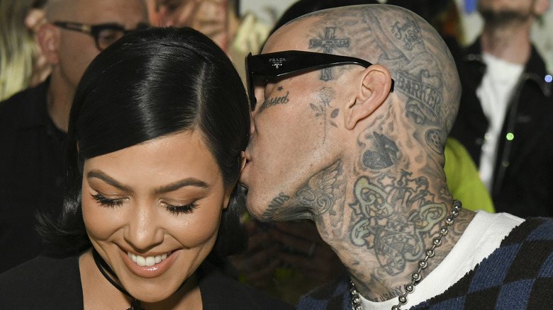 Travis Barker kisses Kourtney Kardashian