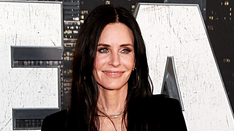 Courteney Cox smiling on the red carpet