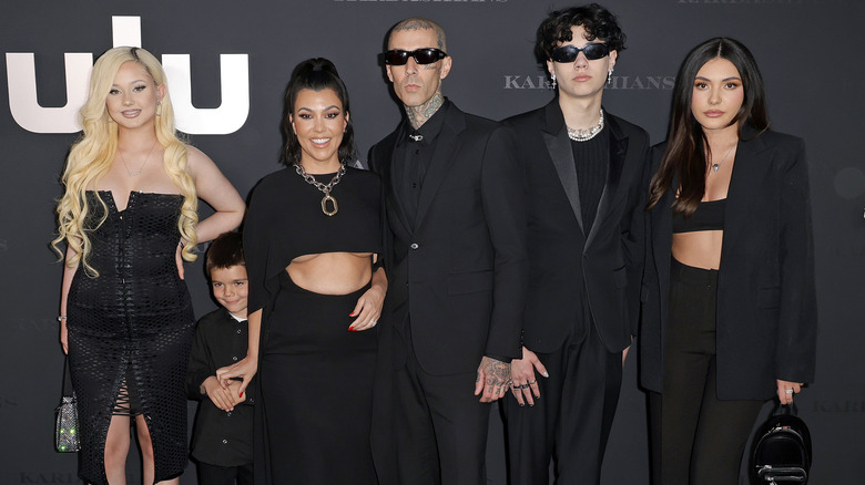 Kourtney Kardashian and Travis Barker with kids at premiere