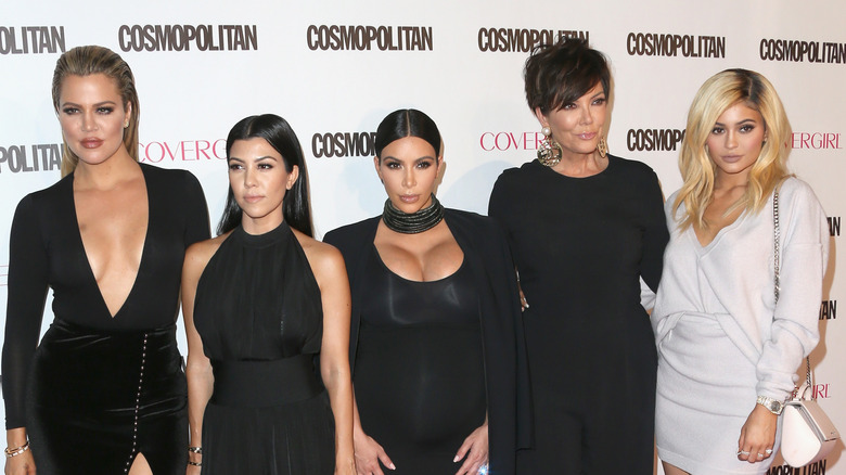 Kris Jenner and her daughters attend an event