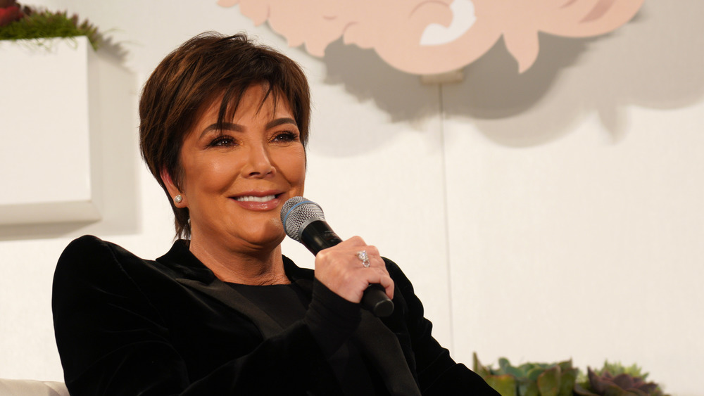 Kris Jenner with a microphone