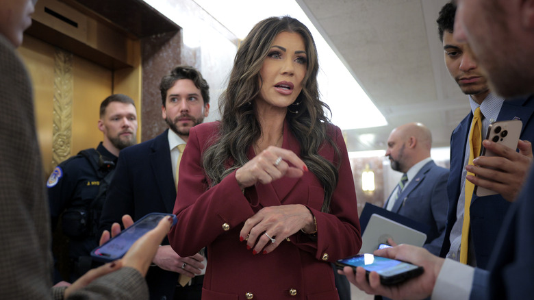 Kristi Noem speaks to reporters