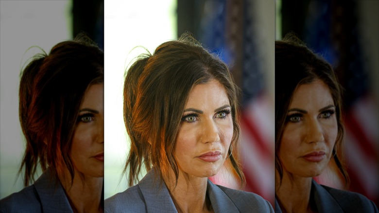 Kristi Noem has a pouty face and frizzy hair