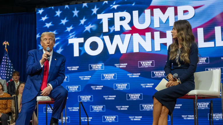 Donald Trump and Kristi Noem at a Trump town hall event