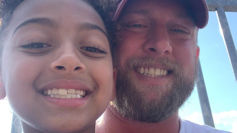 Kyle Chrisley and his daughter Chloe smiling 