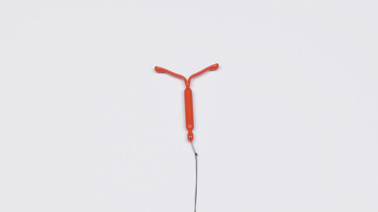 IUD isolated on white background.