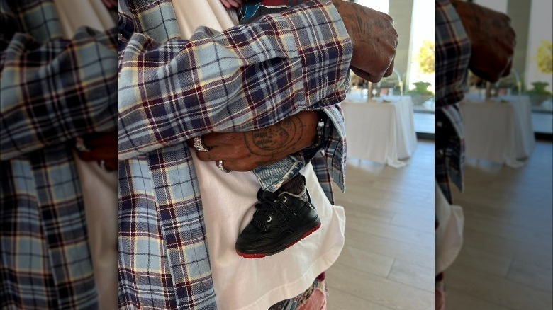 Kylie Jenner's young son in Travis Scott's arms