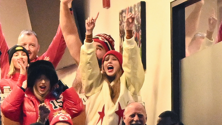 Brittany Mahomes, Jason Kelce, and Taylor Swift celebrating at the Chiefs-Bills game