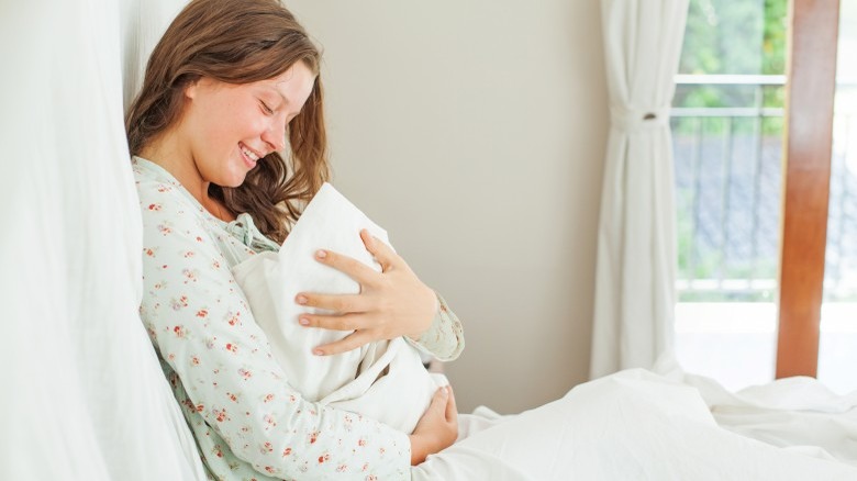 woman with baby after labor