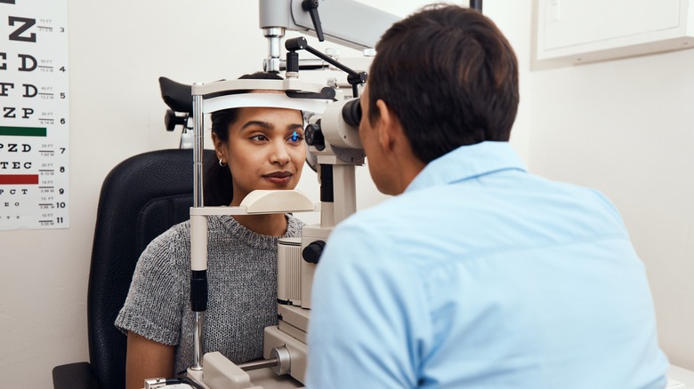 Woman getting an eye exam