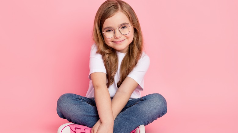 Young girl wearing glasses