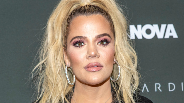 Khloé Kardashian with a high ponytail