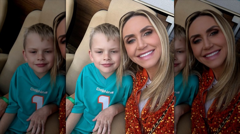 Lara Trump posing with her son Luke Trump