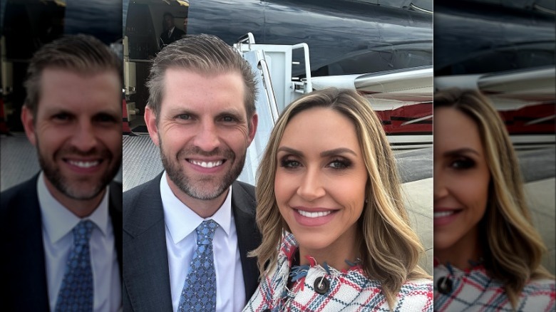 Eric Trump and Lara Trump in front of a jet