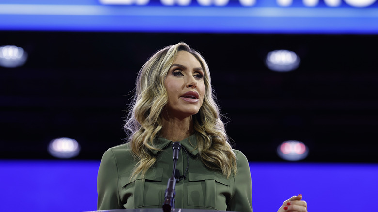 Lara Trump stands at a podium