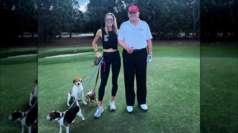 Lara and Donald Trump with dogs