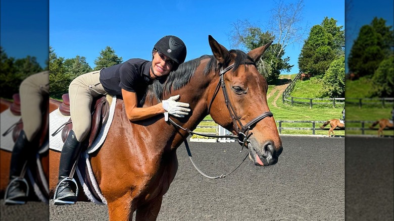 Lara Trump posing on a horse