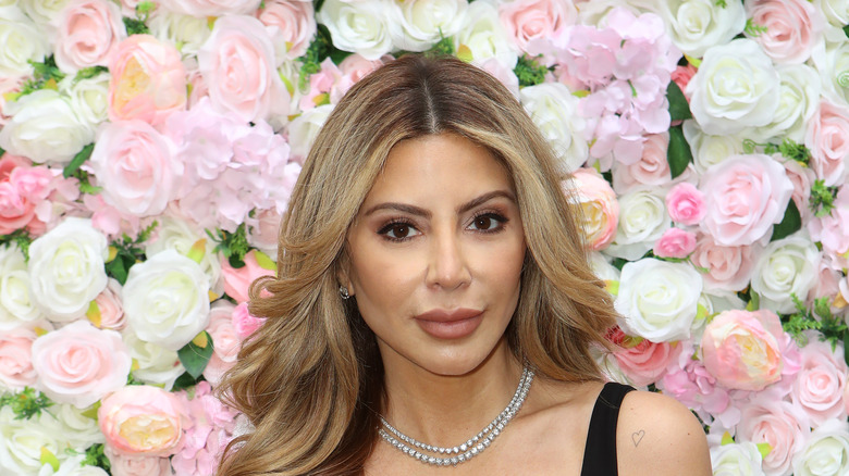 Larsa Pippen and a wall of roses