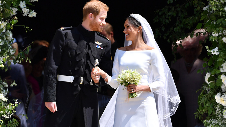 Prince Harry and Meghan Markle laughing on wedding day