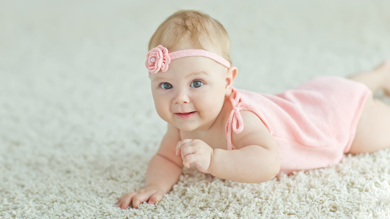 baby girl with rose headband