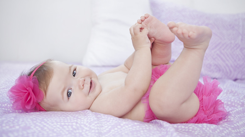 baby in tutu with headband