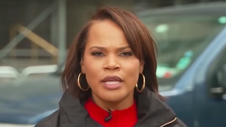 Laura Coates reporting outside Manhattan courthouse