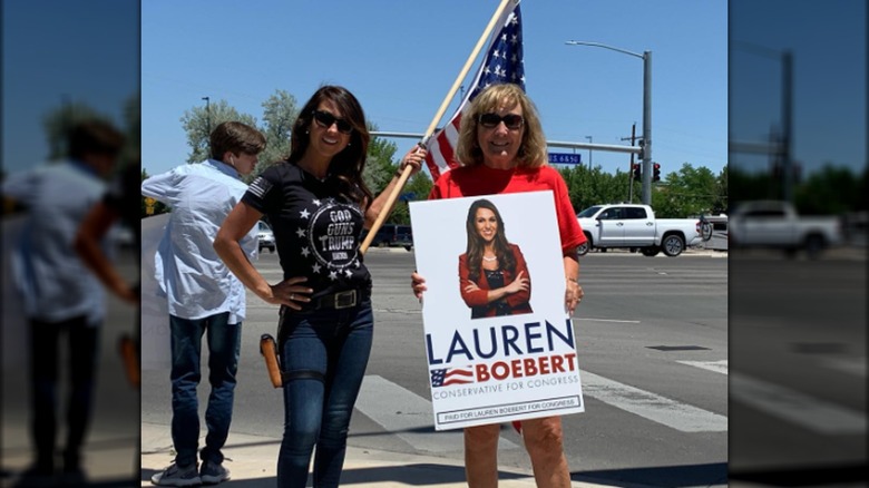 Lauren Boebert holding a flag 