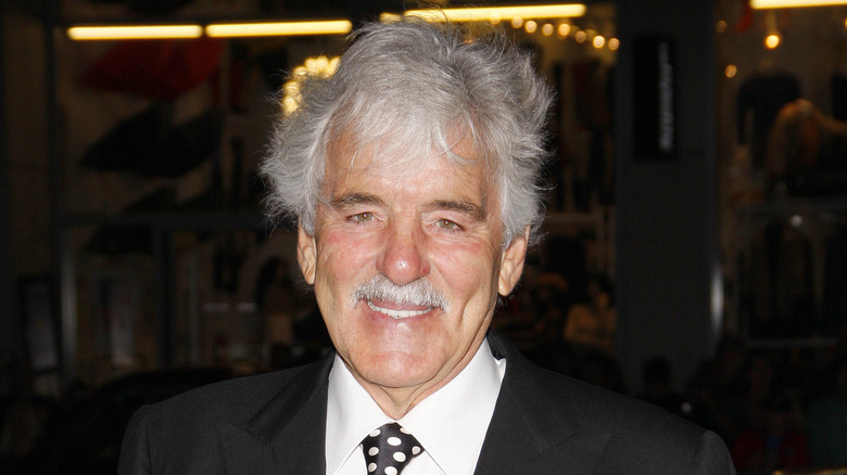 Dennis Farina wearing a polka dot tie