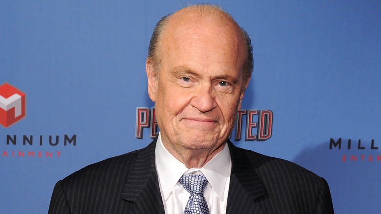 Fred Thompson wearing a striped suit