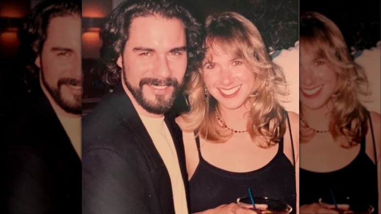 Janet Holden smiles alongside Eric McCormack