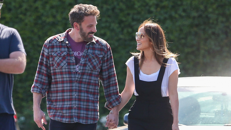 Ben Affleck and Jennifer Lopez holding hands