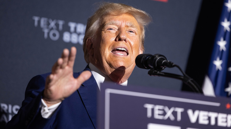 Donald Trump standing at podium