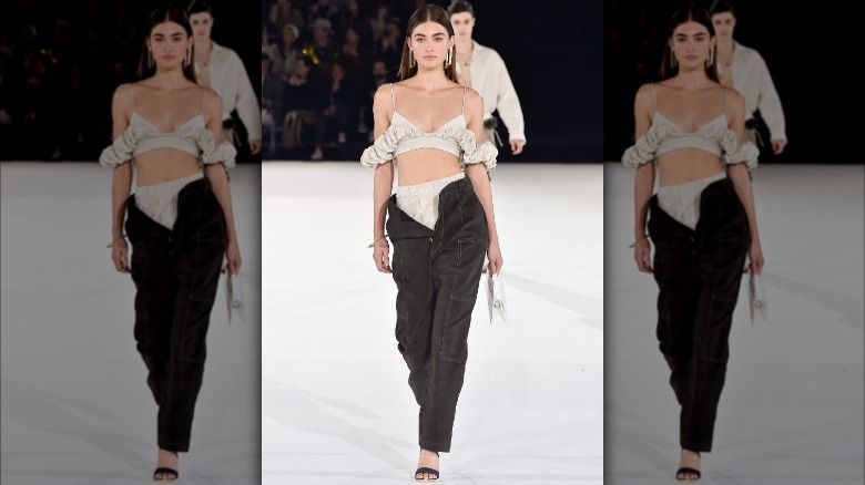 Jacquemus runway unbuttoned jeans trend