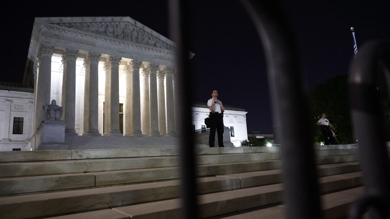 Police officer standing guard at Supreme Court