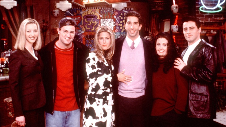 The cast of "Friends" posing on set