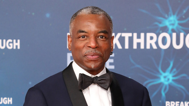 LeVar Burton posing in a tux